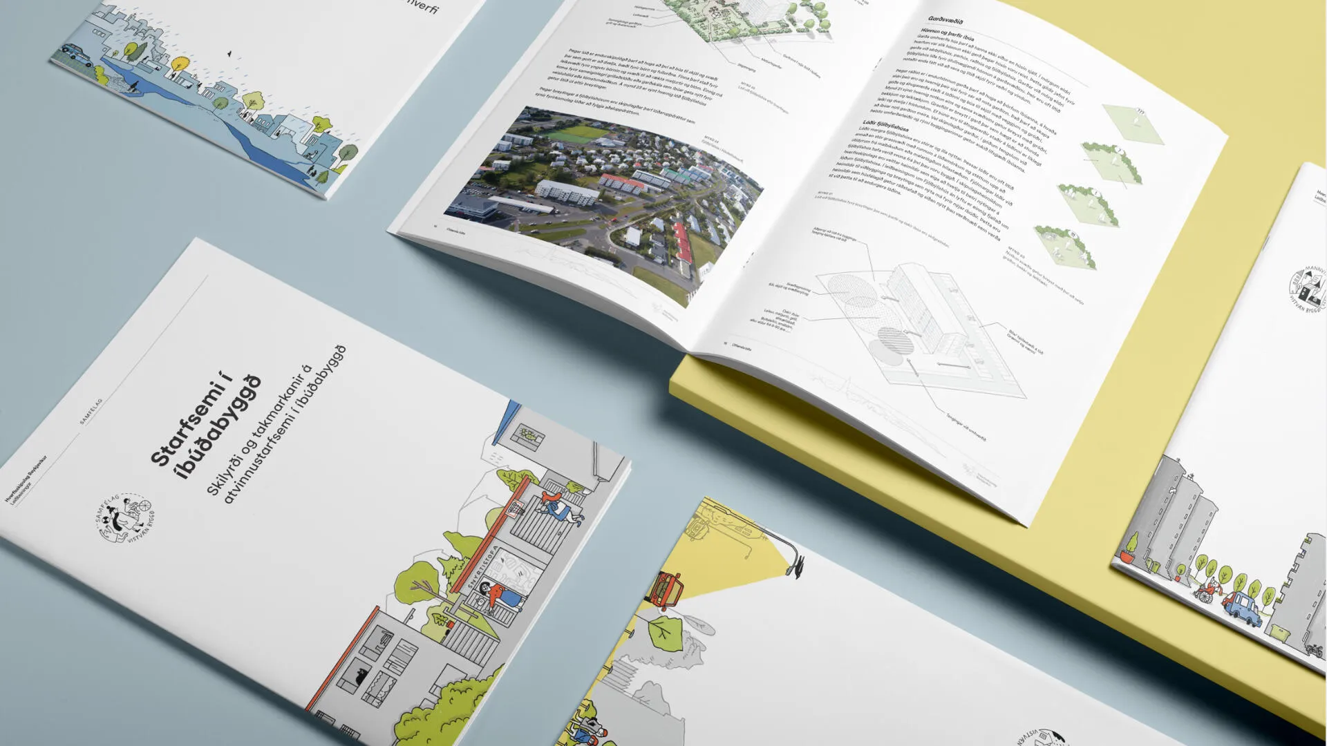 Open planning booklets combining photography, diagrams and illustrations.